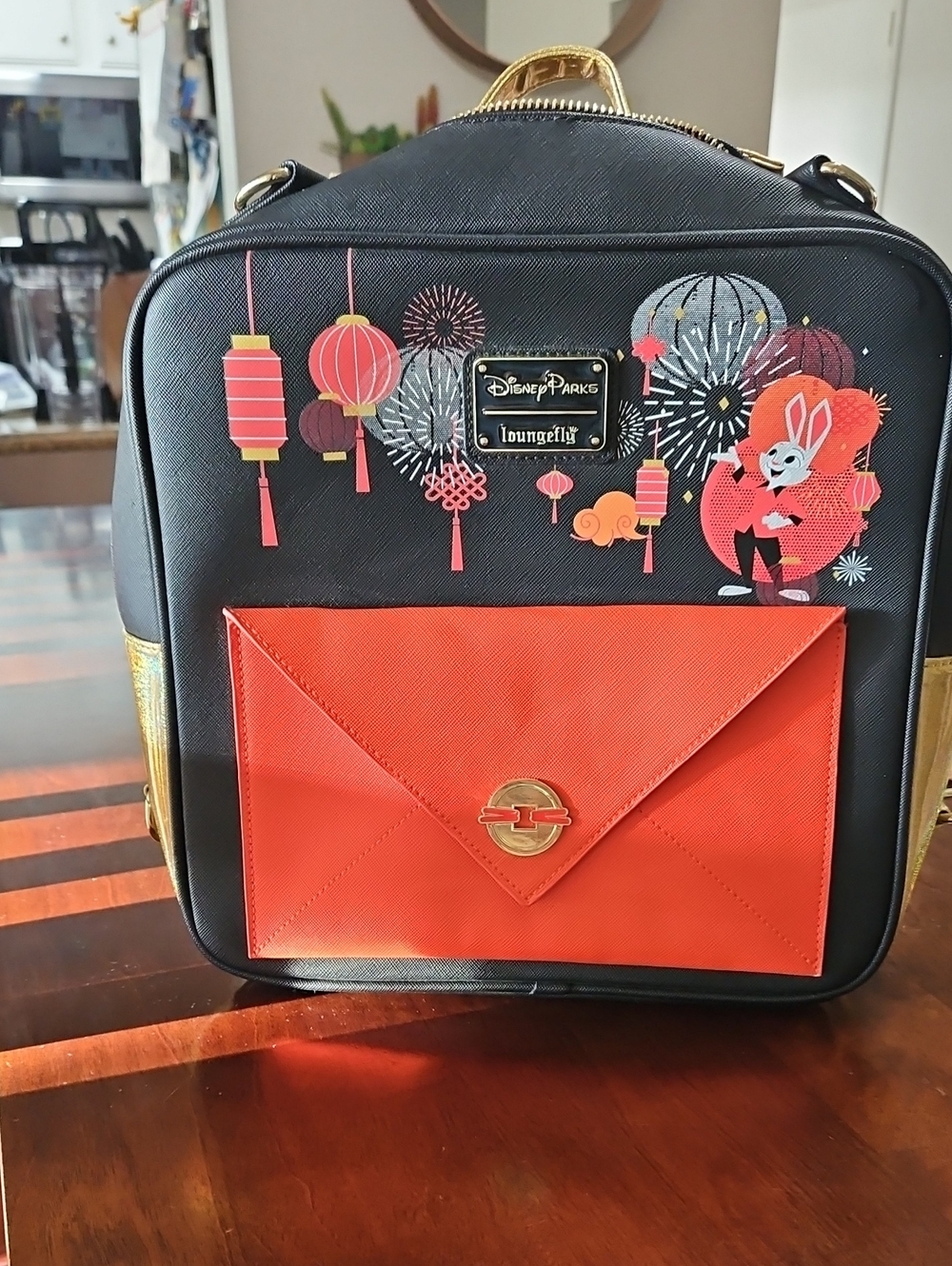 Loungefly Black Mini Backpack with Red Front Pocket and Lantern Print